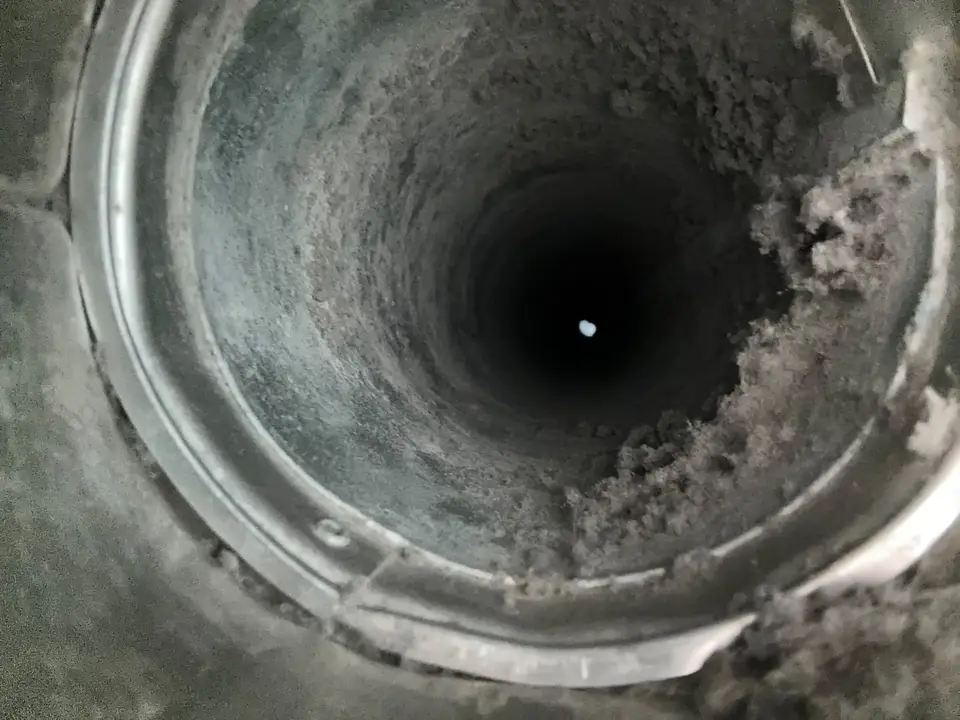 Dryer vent duct packed with lint